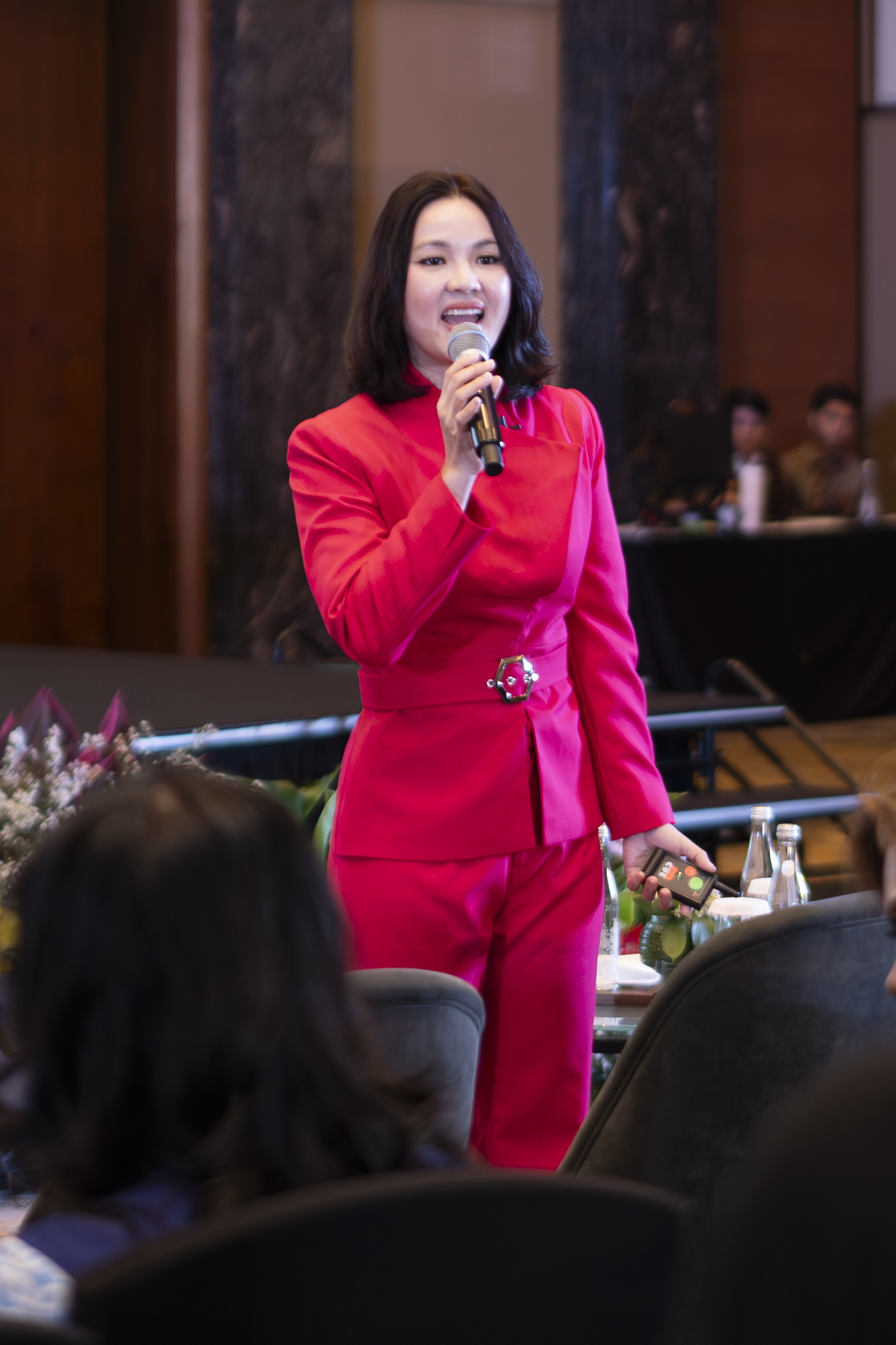 Yulia Saksen speaking to an audience